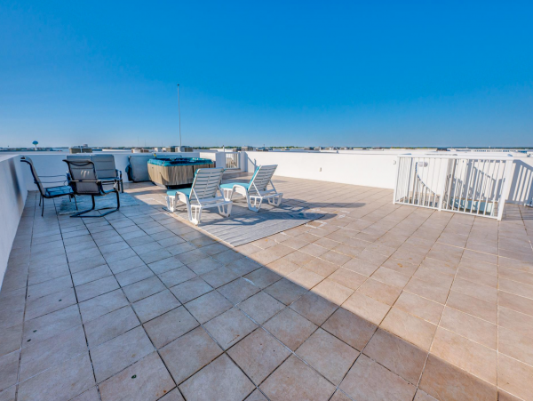 Sweeping views of Bay and Gulf from Private rooftop patio
